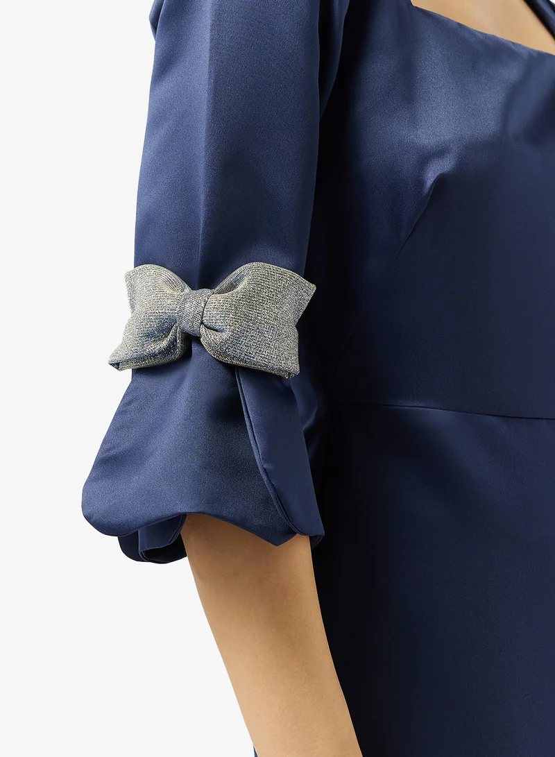 Namshi x  Evening Gown With Statement Shimmer Bow for Women | Best Price UAE